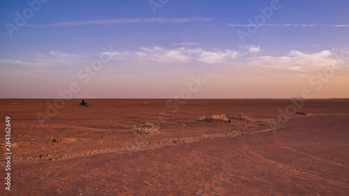 Lonely biker in the desert