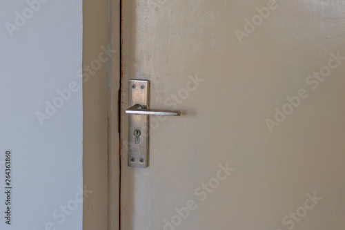 Closed door with lock and handle