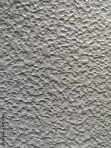 paint bomb white color on the wall rough surface texture material background