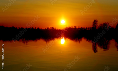 Fototapeta Naklejka Na Ścianę i Meble -  Beautiful sunset on the Volkhov river in Novgorod Russia