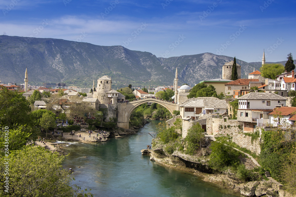 Mostar with the Old Bridge houses and minarets in Bosnia and Herzegovina