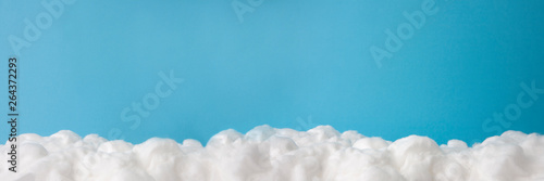 cloud made out of cotton wool on sky blue background