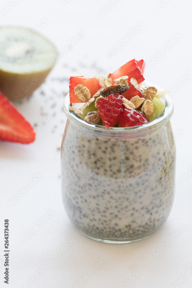 Healthy vegan chia pudding in a jar with fresh berries Healthy vegan chia pudding in a jar with fresh berries