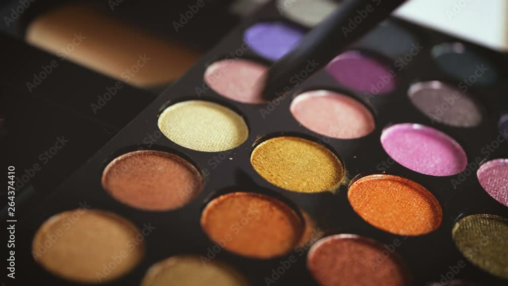 Close up cosmetic , makeup , a blush on and colorful glamour glitter eyeshadow using , 4k dci resolution Close up cosmetic , makeup , a blush on and colorful glamour glitter eyeshadow using , 4k dci resolution