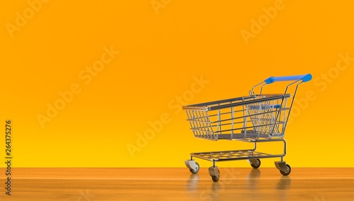 Shopping cart on orange background