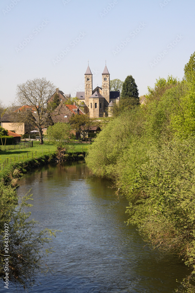 View over small river Rur on basilica of Sint Odilienberg (near Roermond) - Netherlands