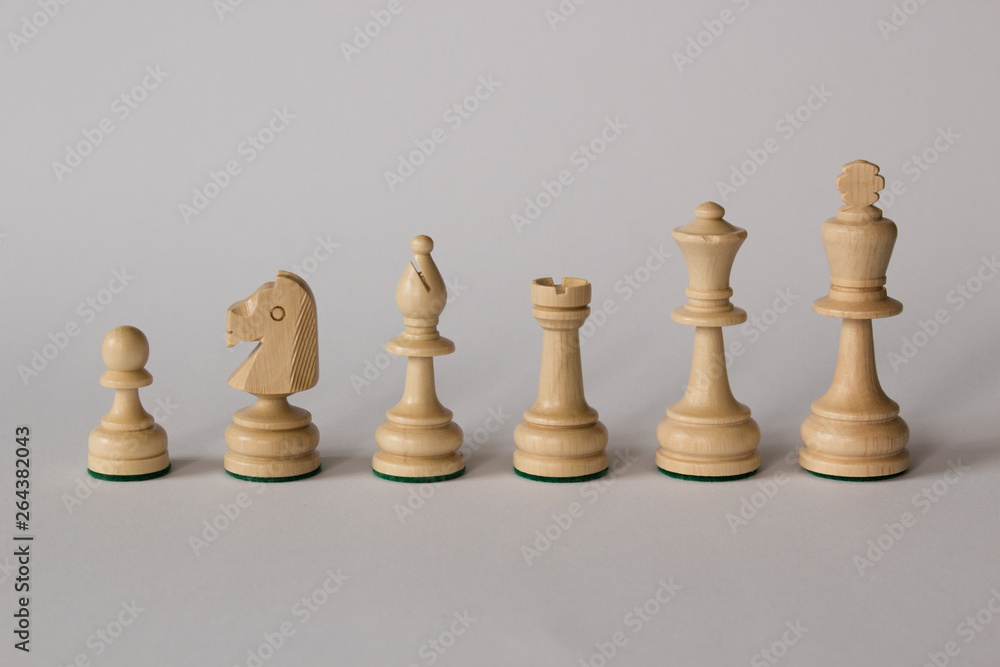White chess pieces with plain background. White chess pieces with plain background.
