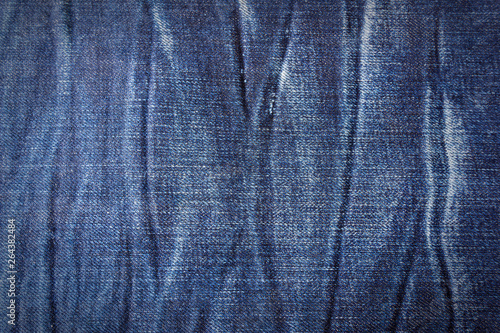 Close up Blue denim jeans for design and decor on background, weaving blue denim jeans