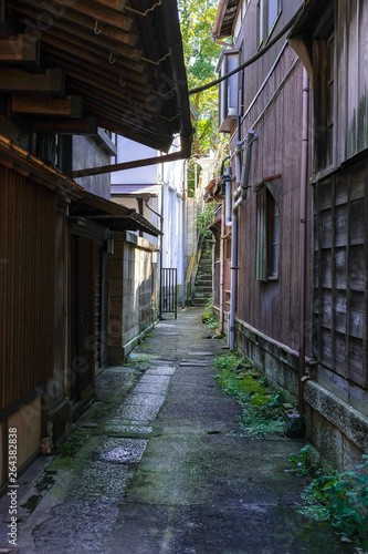 Old vintage wooden Japanese house and near river.The old brick street wtih old town area, Traditional japanese wood facade in a typical house of Japan.