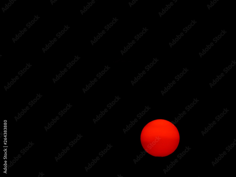 sun for sunset in sky on black background sun for sunset in sky on black background
