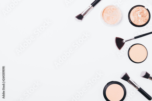 Flat lay frame of cosmetic powders