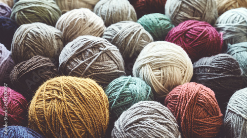 Canvas Print Vintage toned picture of wool yarn balls, shallow depth of field.
