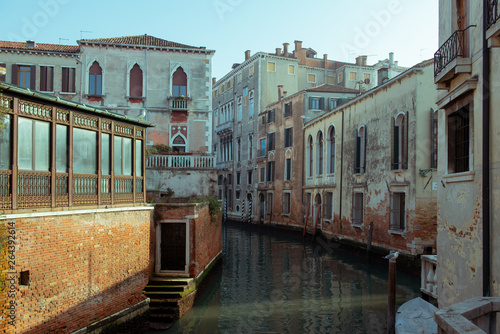 Сhannel with boats in Venice, Italy. Beautiful romantic italian city. photo