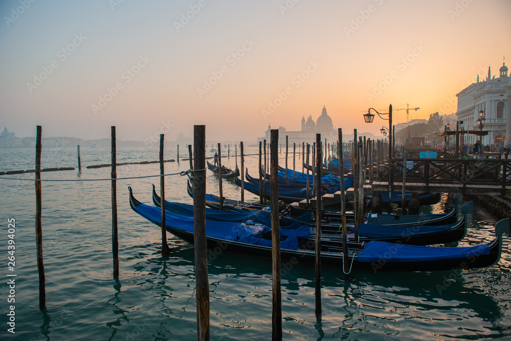 Grand Сhannel with gondolas at sunset, Venice, Italy. Beautiful ancient romantic italian city.