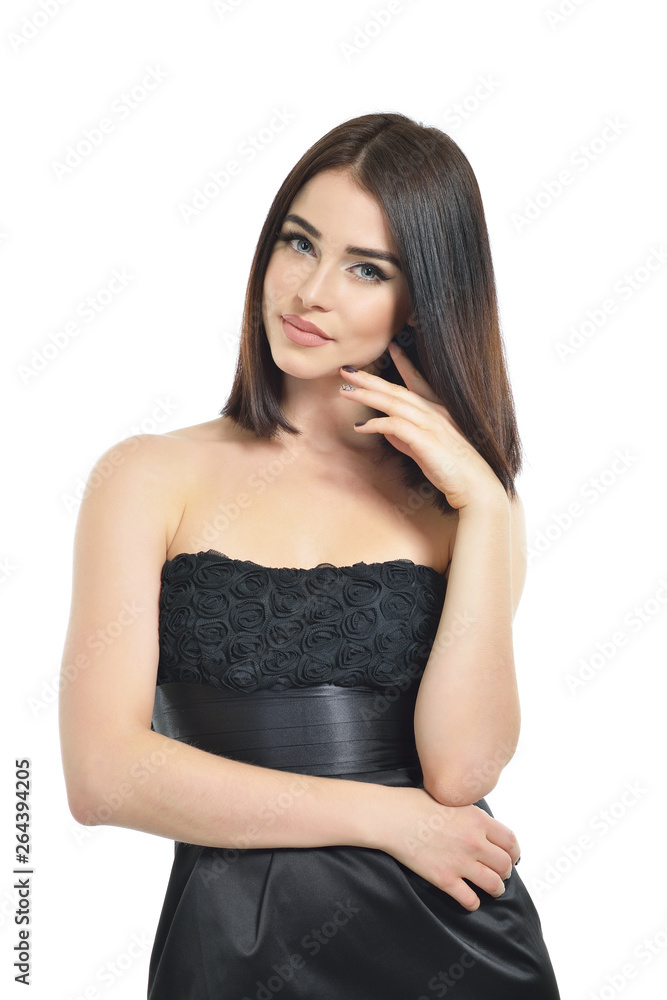 Beauty. Portrait of attractive young woman over white background. Amazing girl wearing black dress with perfect makeup isolated on white background. Beauty. Portrait of attractive young woman over white background. Amazing girl wearing black dress with perfect makeup isolated on white background.