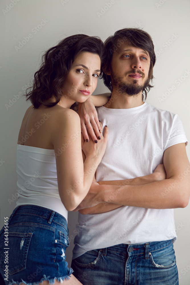 guy and a girl on a white background in the Studio guy and a girl on a white background in the Studio