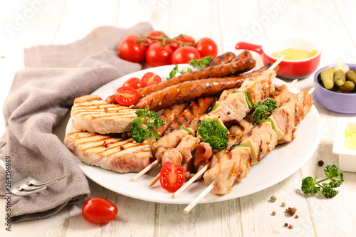 barbecue meat with sausage, skewer and sirloin