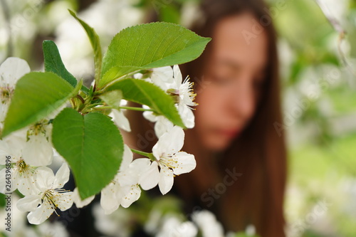 young woman in spring garden