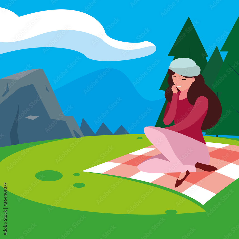beautiful woman with beret seated in the park picnic day