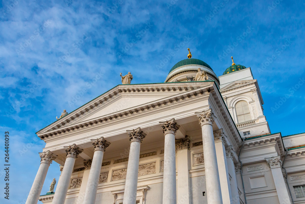 Helsinki Cathedral at sunny day and blue sky in background. Finnish lutheran church building in center of city
