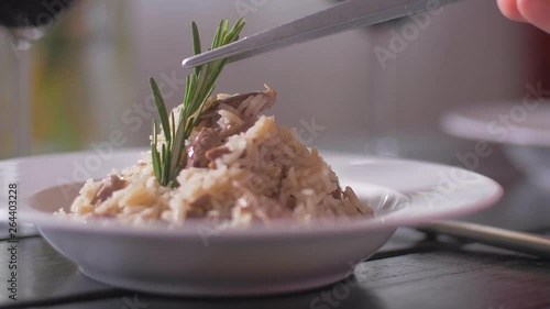 Garnish with rosemary risotto with veal fillet