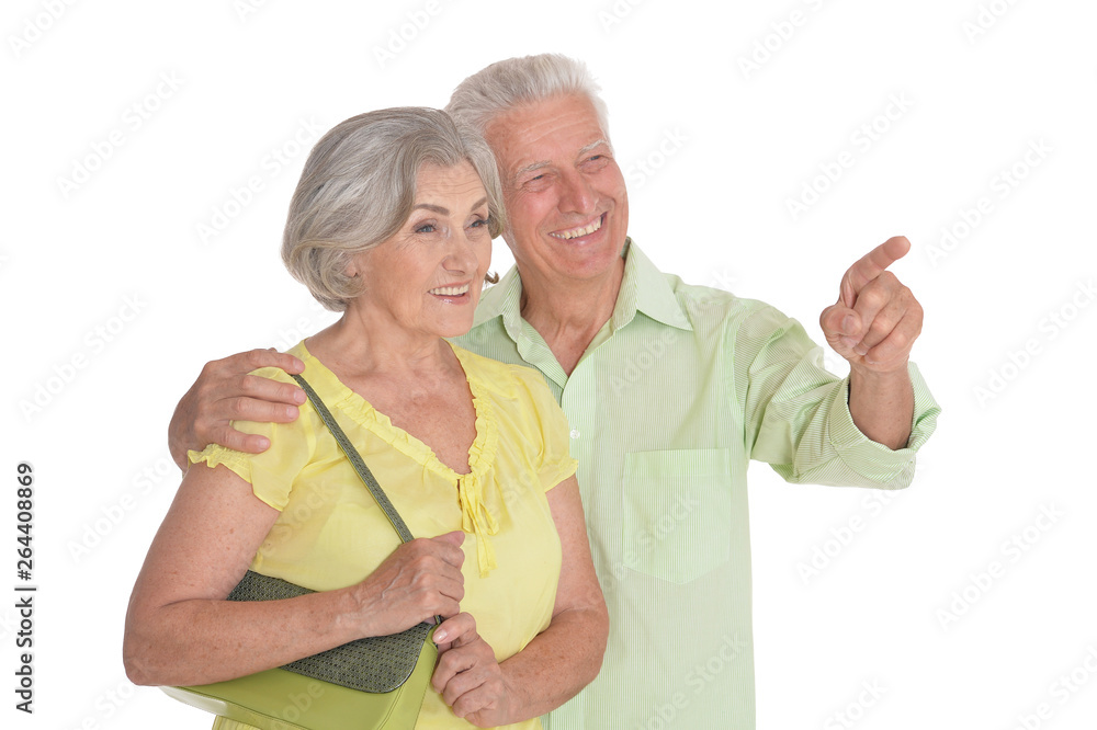 Portrait of a happy senior couple pointing to the right Portrait of a happy senior couple pointing to the right