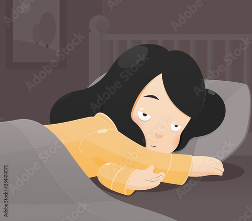 Woman lying in bed suffering from insomnia.