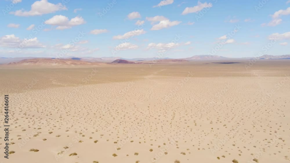 Flight over dry desert lands - aerial photography Flight over dry desert lands - aerial photography