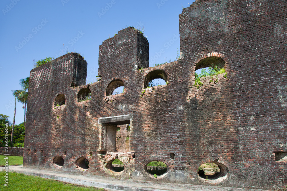 Fortress. Brick walls of Fort Zeelandia, Guyana. Fort Zealand is located on the island of the Essequibo river. The Fort was built in 1743 during the Dutch colonization. World tourism. Fortress. Brick walls of Fort Zeelandia, Guyana. Fort Zealand is located on the island of the Essequibo river. The Fort was built in 1743 during the Dutch colonization. World tourism.