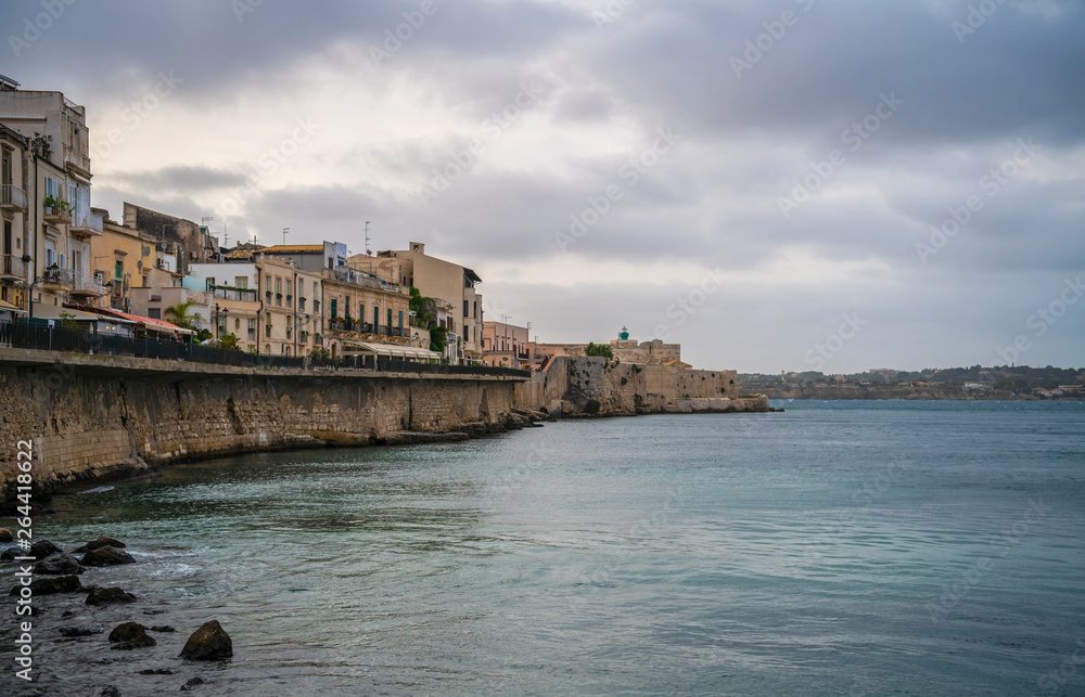 Sea front and cityscape of the of the island Ortigia in famous sicilian town Syracuse, Sicily, south Italy