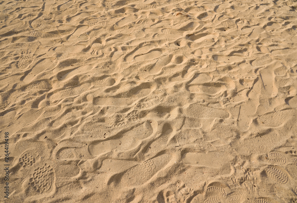 closeup of sand pattern of a beach in the summer closeup of sand pattern of a beach in the summer