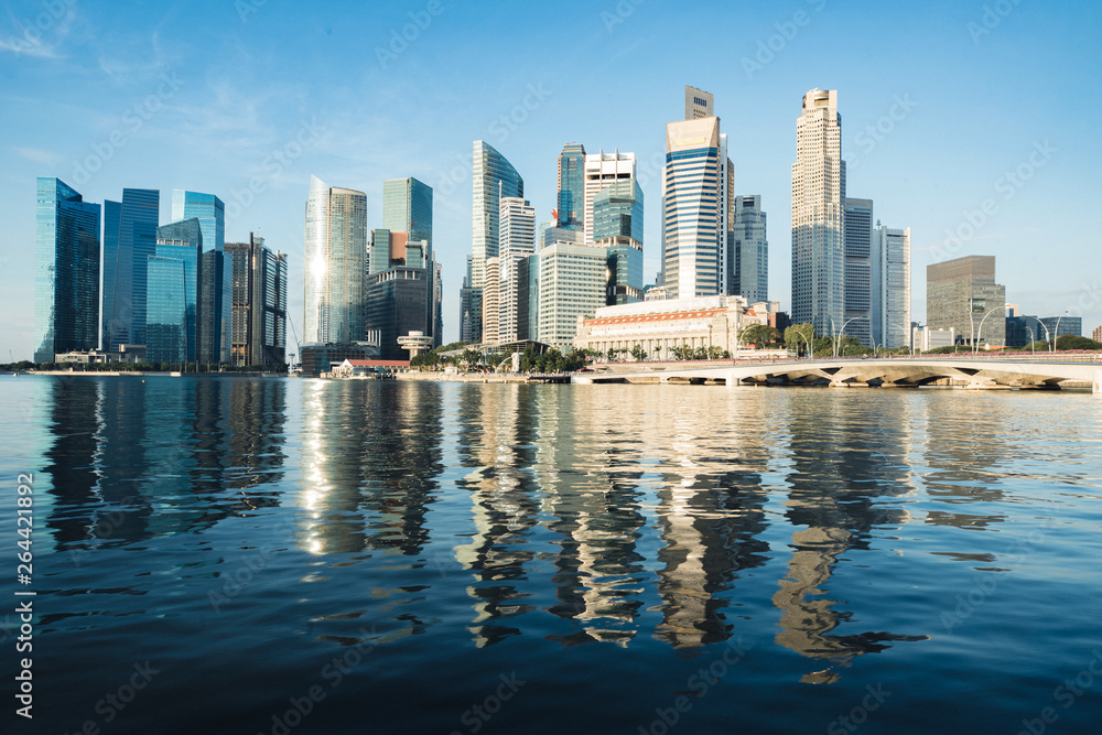 Fototapeta premium Singapore business district skyline and skyscraper in morning at Marina Bay, Singapore.