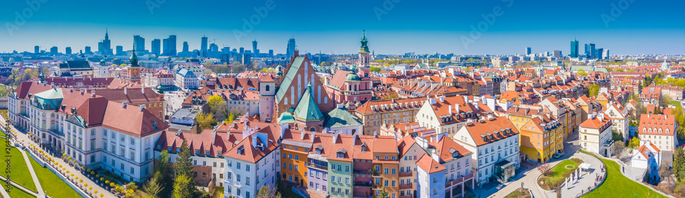 Historic cityscape panorama with high angle view of colorful architecture rooftop buildings in old town market square.