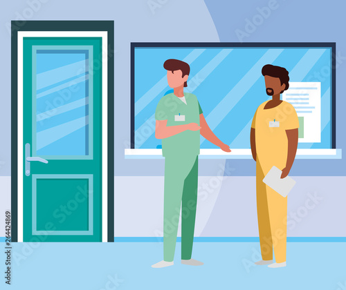 interracial male medicine workers in hospital reception