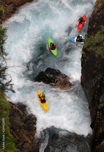 kayaker in waterfall