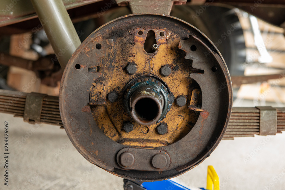 Rusty drum brake, A drum brake jeep disassembled in a garage