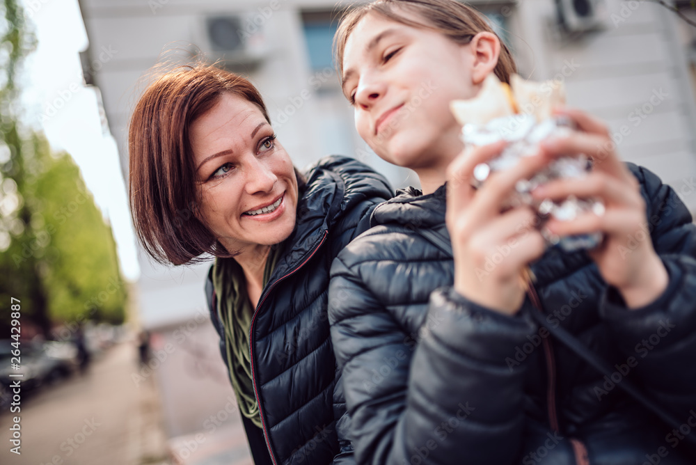 Mother and daughter having fun outdoors Mother and daughter having fun outdoors