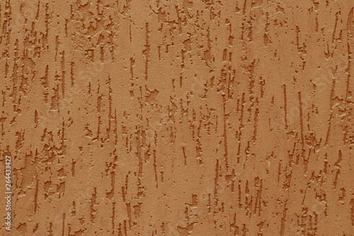 Fototapeta Abstract pattern with embossed from yellow stucco on a concrete wall