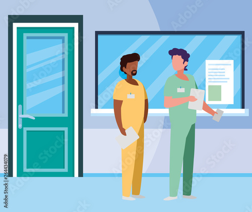 interracial male medicine workers in hospital reception