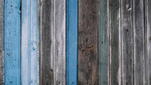 Old colorful wooden texture background  close-up. Wall of rural house. Blurred pattern. 