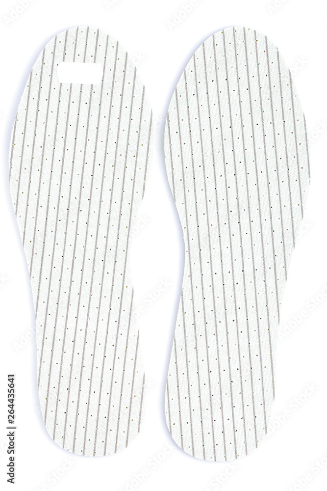 A pair of insoles for footwear isolated on white A pair of insoles for footwear isolated on white