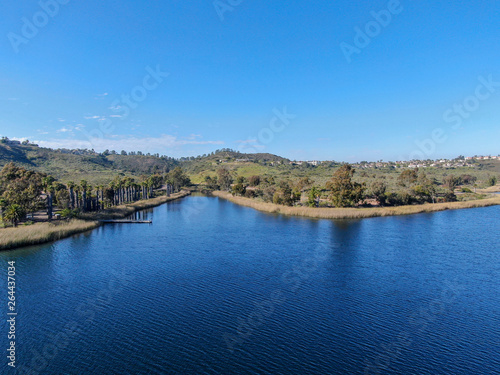Aerial view of Miramar reservoir in the Scripps Miramar Ranch community  San Diego  California. Miramar lake  popular activities recreation site including boating  fishing  picnic   5-mile-long trail.