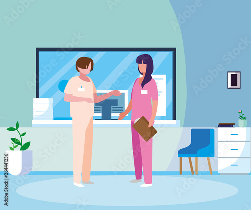 couple medicine workers in hospital reception