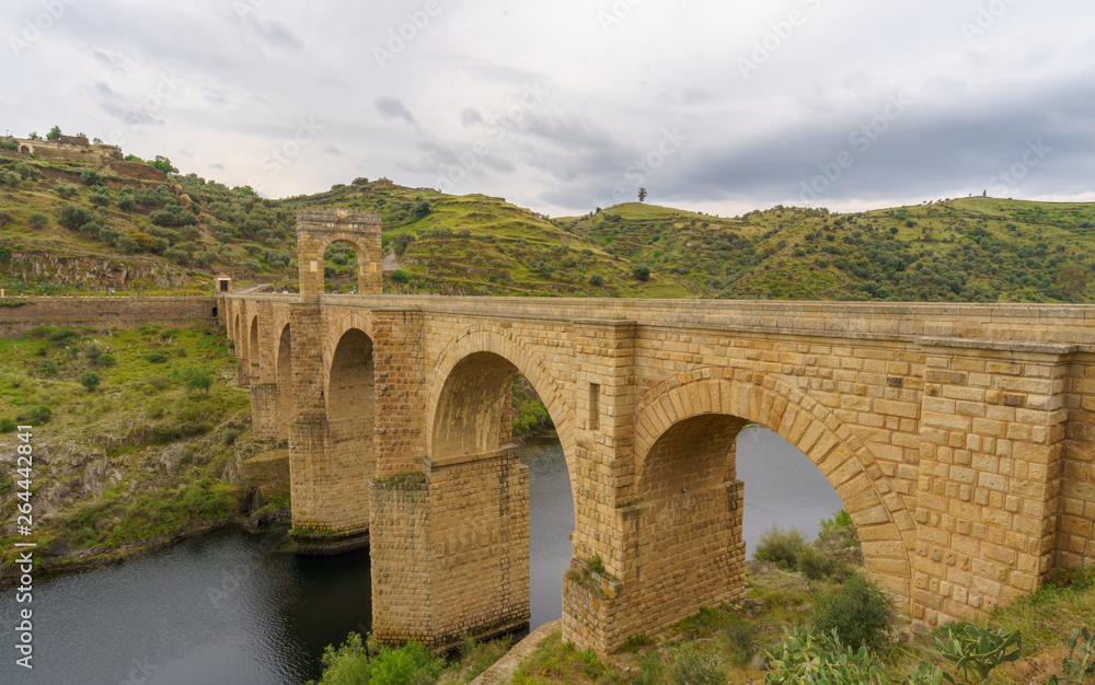 Obraz premium The Alcantara Bridge also known as Trajan Bridge at Alcantara is a Roman bridge at Alcantara, in Extremadura, Spain.