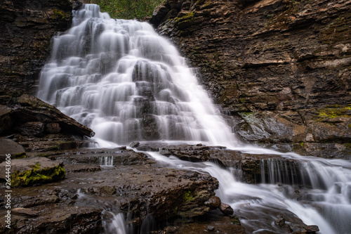 Fototapeta Naklejka Na Ścianę i Meble -  Quality Waterfall near Tumbler Ridge, British Columbia, Canada, long exposure to smooth out the water and create a milky effect