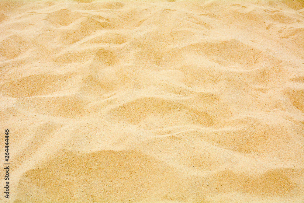 closeup of sand pattern of a beach in the summer closeup of sand pattern of a beach in the summer