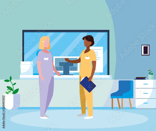 interracial female medicine workers in hospital reception