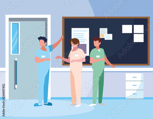 male medicine workers with uniforms in hospital corridor