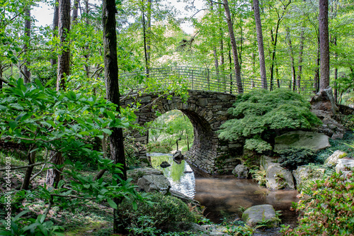 Stone bridge with a stream in a forest in  the Ozark mountains Arkansas