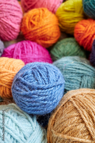 Picture of colorful wool yarn balls, selective focus.